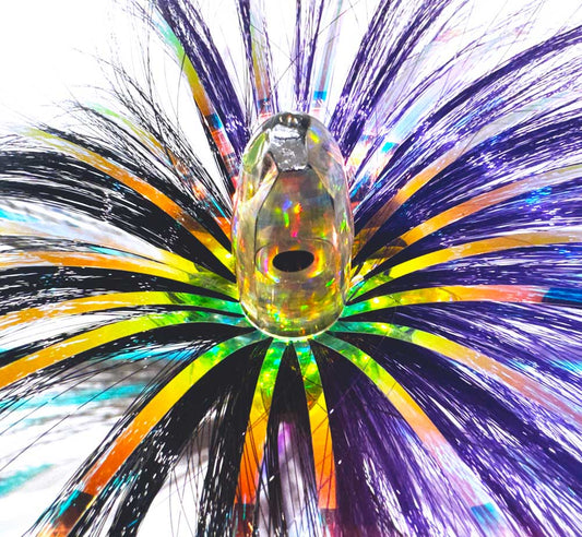 Close-up of the 3oz HooSkull crystal mirror head with purple/black witch hair and mylar flash
