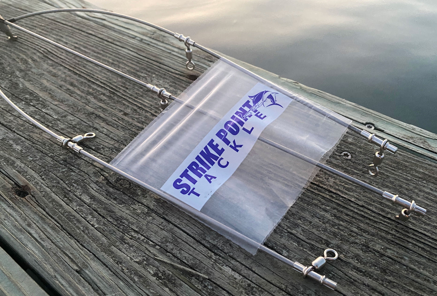 36 inch stainless steel dredge bar with 13 drops - single bar close up on dock
