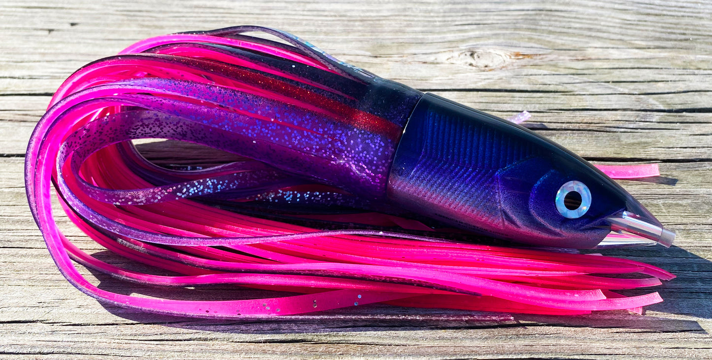 Moon Tide Dart Magic big game trolling lure - purple/blue/silver smooth bullet head with black/purple laser plate and pink double skirts