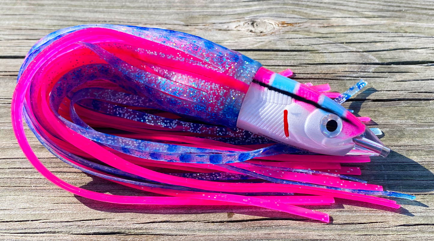Moon Tide Dart Magic Pink/Blue/White big game trolling lure - smooth bullet head with blue/silver/pink and solid pink double skirts