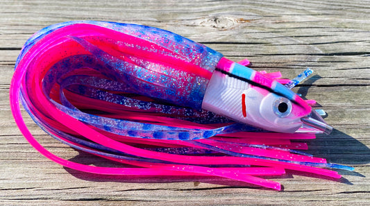 Moon Tide Dart Magic Pink/Blue/White big game trolling lure - smooth bullet head with blue/silver/pink and solid pink double skirts