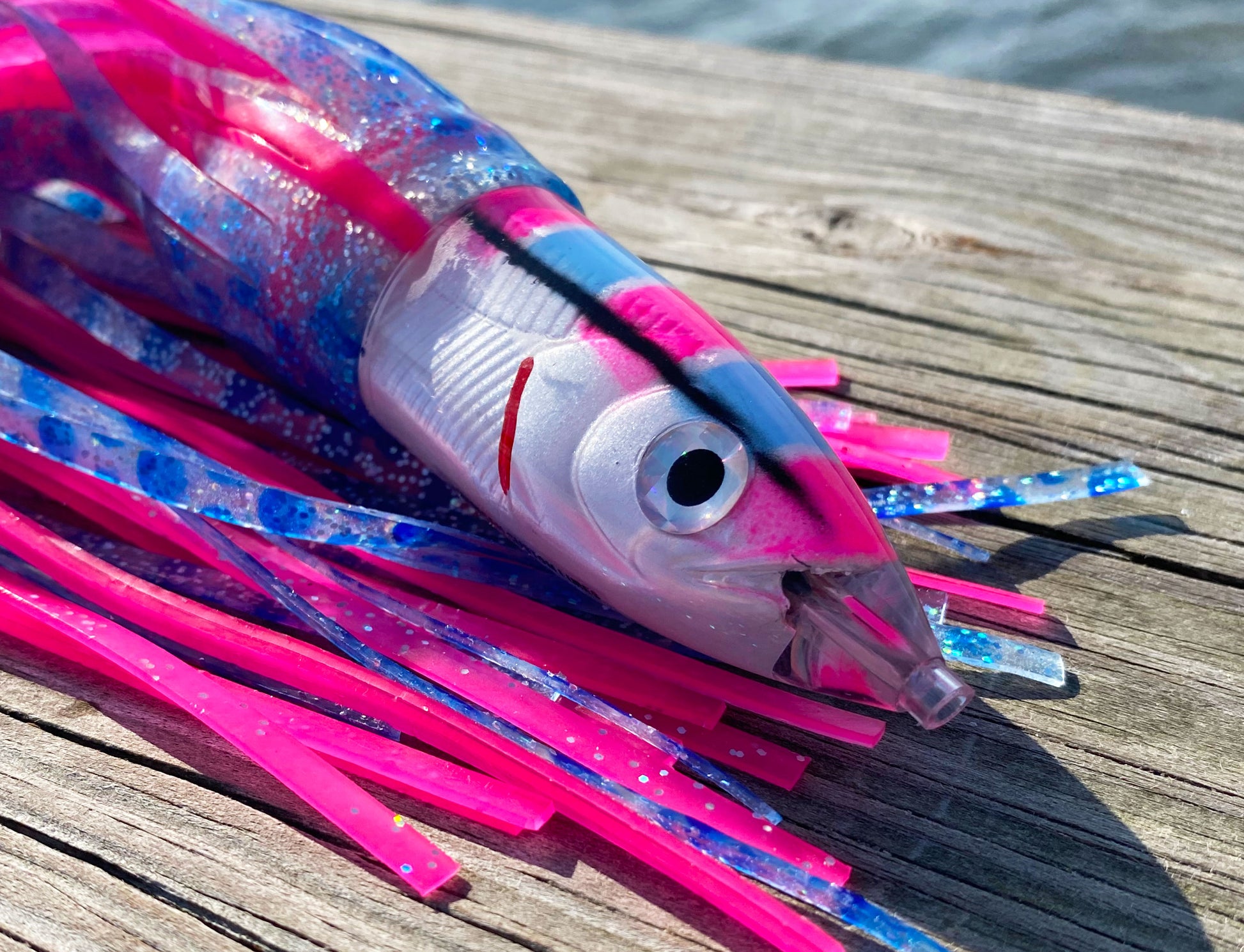 Moon Tide Dart Magic Pink/Blue/White close-up of pink/blue/white smooth bullet head with reflective eye