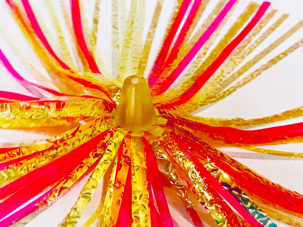 Mylar Duster Lure 4.5" Gold Pink Crinkle Flash - close up of clear acrylic head