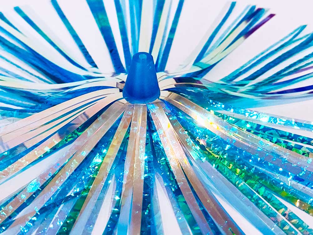 Mylar Duster Lure 4.5" Green Crinkle Holographic - close up of light blue acrylic head