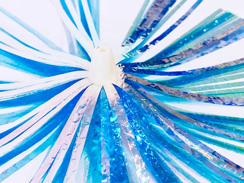 Mylar Duster Lure 4.5" Blue Pearl Crinkle - close up of white acrylic head